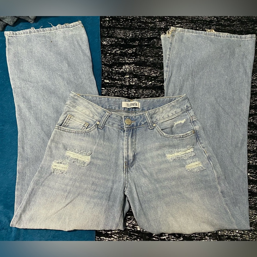 Ripped high-waisted blue jeans